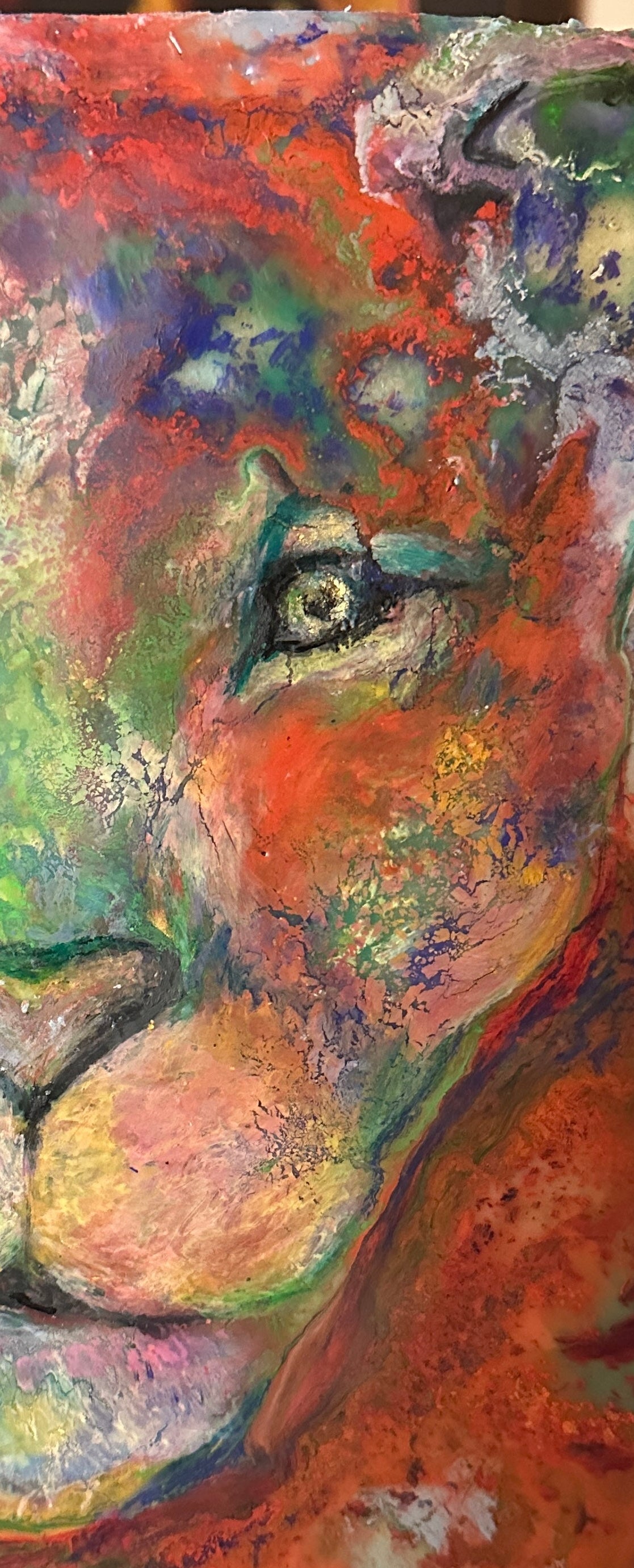 Colorful abstract painting of a lion's face