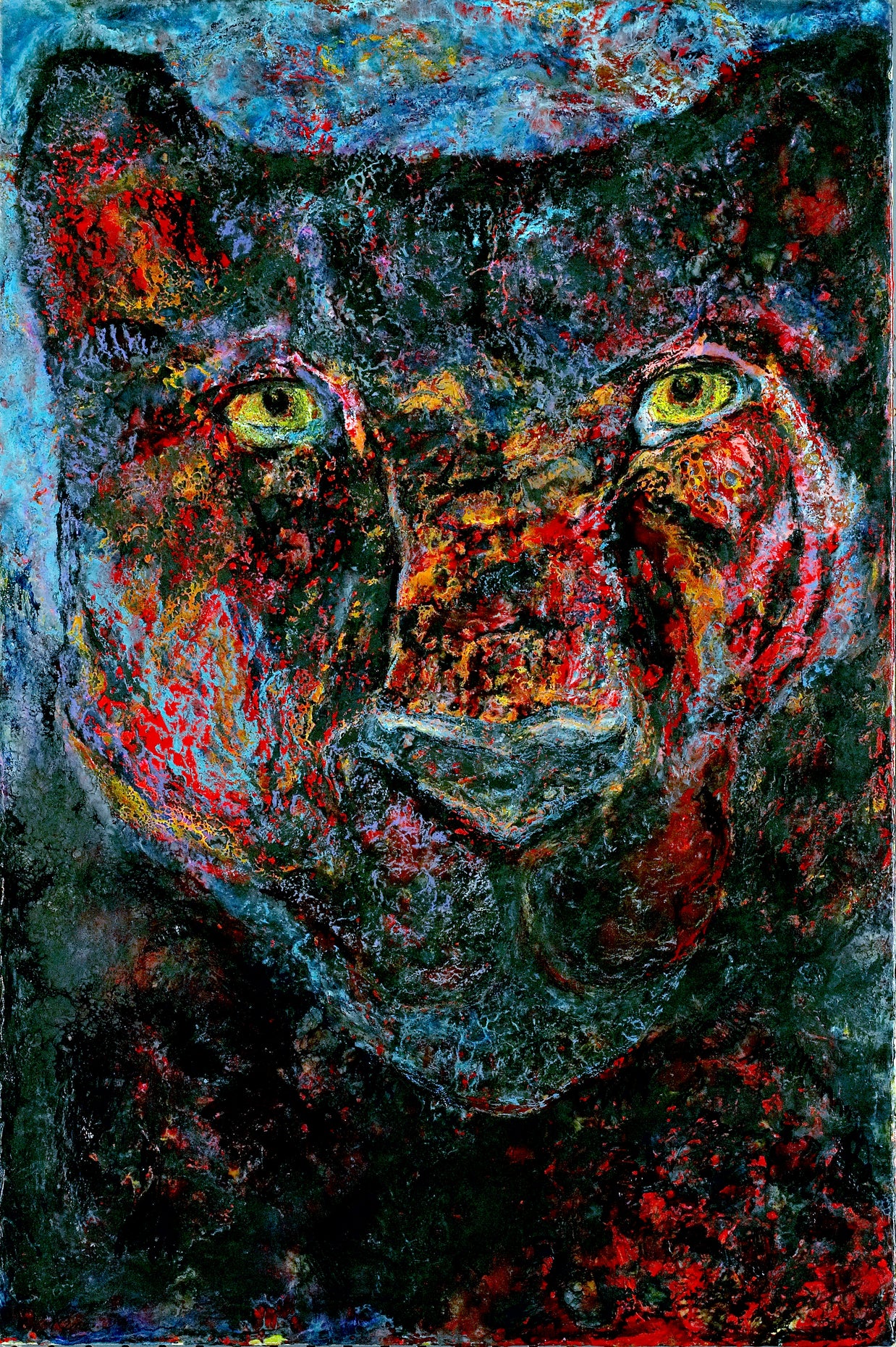 Abstract painting of a cat's face with vibrant colors