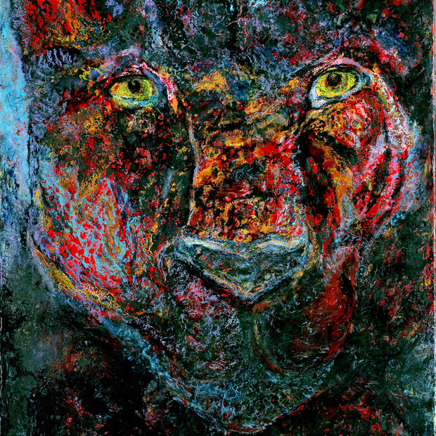 Abstract painting of a cat's face with vibrant colors
